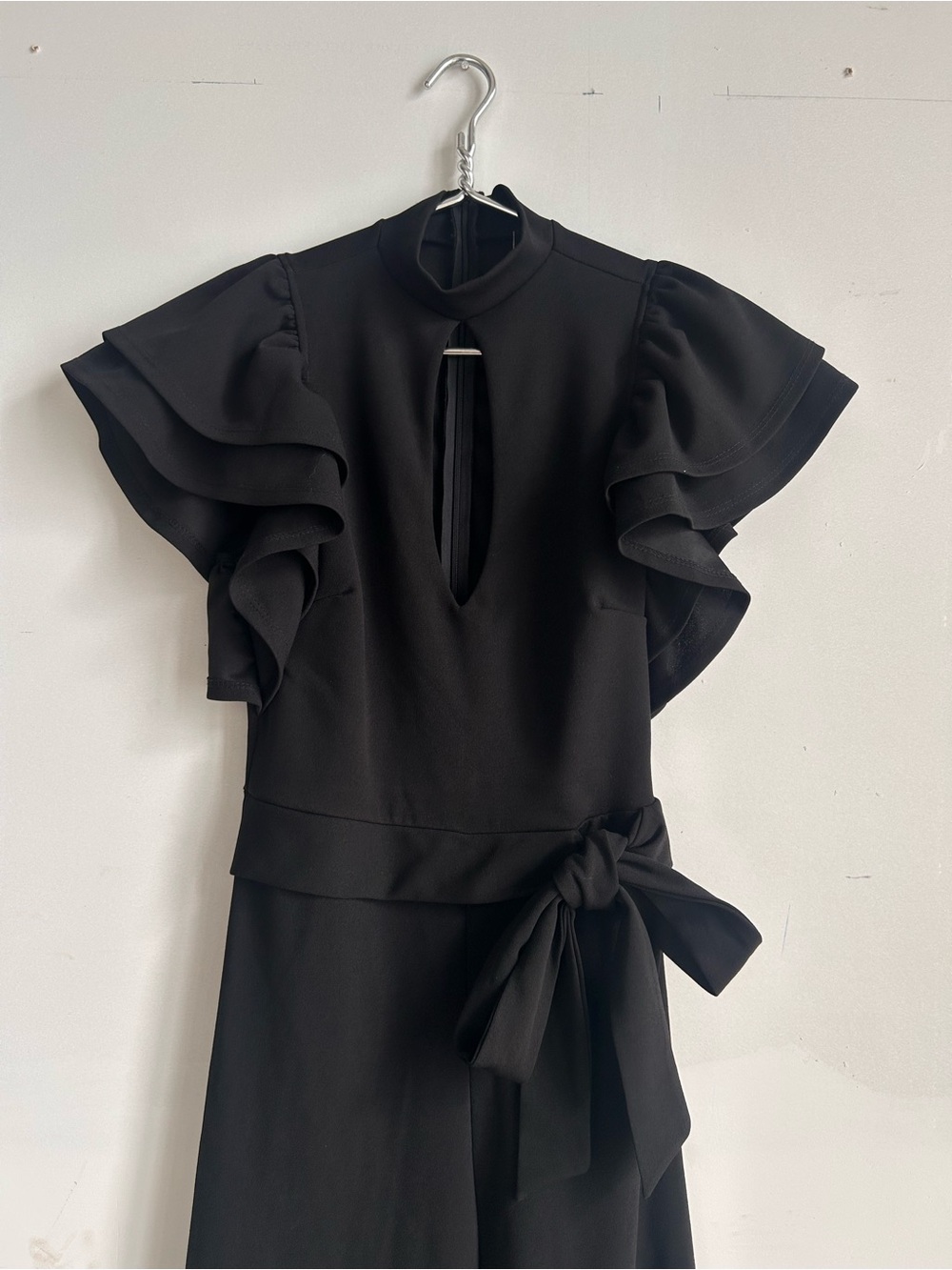 Elegant Black Ruffle-Sleeve Jumpsuit with Tie Waist and Keyhole Plunge Front